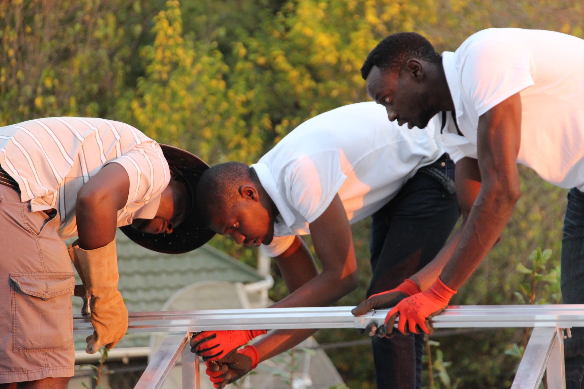 The Lamo Solar team working on an installation